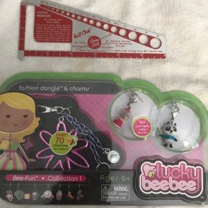 RARE! Lucky bee bee dangle and charms.